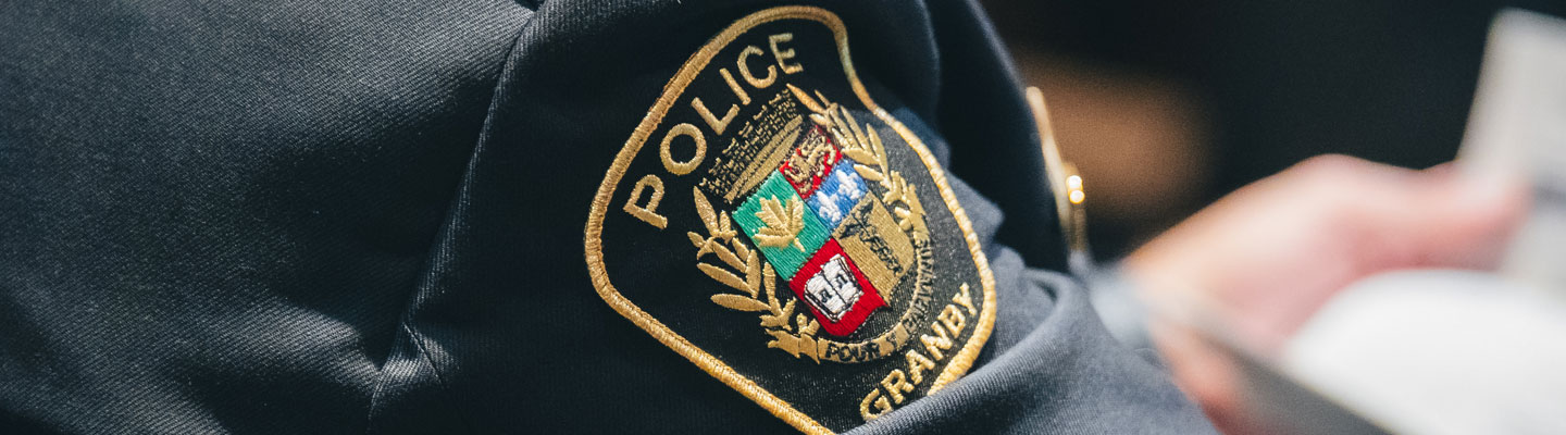 Écusson du Service de police